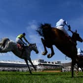 Thanksforthehelp, with Gavin Brouder up, left, on their way to winning the Adare Manor Opportunity Series Final Handicap Hurdle on day two of the Punchestown Festival. Photo: Sportsfile