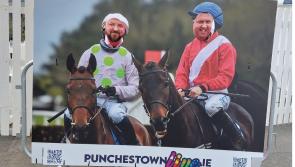 PICTURES: Early smiles at the photo booth as punters converge on Punchestown for Day 1